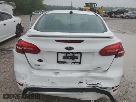 2016 Ford Focus SE с VIN 1FADP3F27GL397700, выставлен на аукционе Copart как лот 59692675 с пробегом 98 188 миль миль и Списание • Salvage title. История ставок и продаж доступна на DreamBid. Изображение 6.