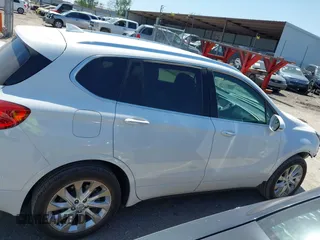 2016 Buick Envision Premium I with VIN LRBFXESX6GD235100, listed as a IAAI auction lot 41985343 with 51,376 mi miles and . Bid and sale history available at DreamBid. Image 14.