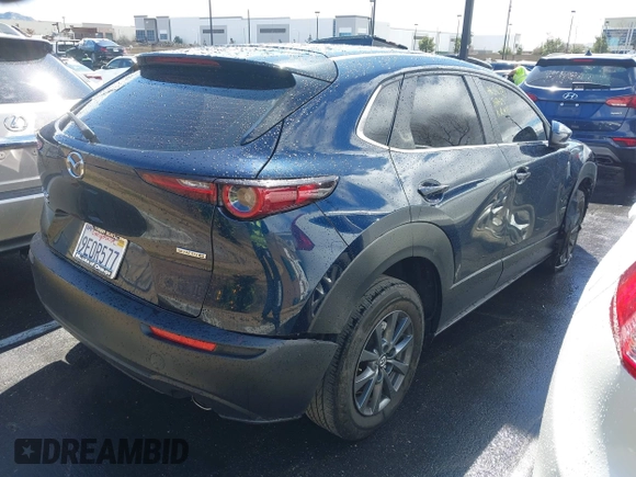 2023 Mazda CX-30 S with VIN 3MVDMBAM9PM541315, listed as a IAAI auction lot 41758162 with 46,296 mi miles and . Bid and sale history available at carsss.com. Image 4.