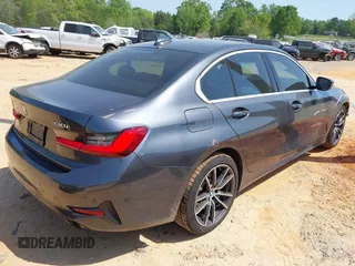 2019 BMW 3 Series 330i with VIN WBA5R1C5XKFH00567, listed as a IAAI auction lot 42076068 with 160,576 mi miles and . Bid and sale history available at DreamBid. Image 4.