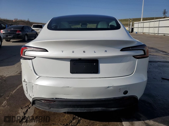 2025 Tesla Model 3 Long Range with VIN 5YJ3E1EAXSF935004, listed as a Copart auction lot 52233195 with 5,873 mi miles and Salvage Title. Bid and sale history available at carsss.com. Image 6.