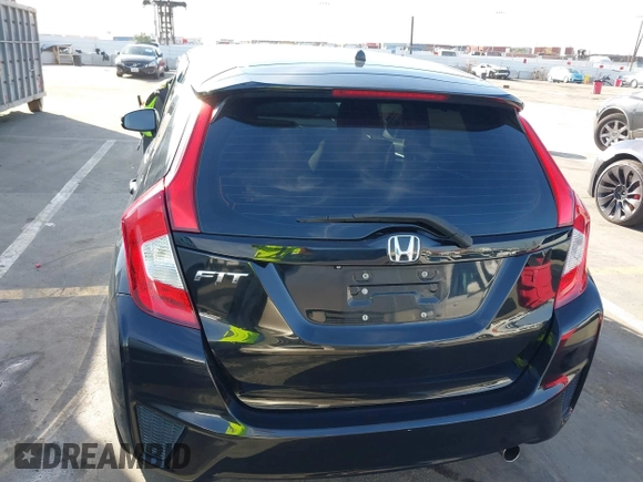 2015 Honda Fit LX z VIN 3HGGK5H57FM717203, wystawiony jako IAAI lot #41615075 z przebiegiem 99 933 mil mil oraz . Historia ofert i sprzedaży dostępna na DreamBid. Obrazek 16.