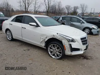 2014 Cadillac CTS Luxury AWD with VIN 1G6AX5S33E0156239, listed as a IAAI auction lot 41452922 with Not Provided miles and . Bid and sale history available at DreamBid. Image 1.
