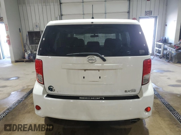 2011 Scion xB z VIN JTLZE4FE6B1125993, wystawiony jako Copart lot #53336335 z przebiegiem 229 378 mil mil oraz Szkoda całkowita • Salvage title. Historia ofert i sprzedaży dostępna na DreamBid. Obrazek 6.
