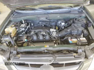 2002 Mazda Tribute LX with VIN 4F2YU09142KM39082, listed as a Copart auction lot 49973375 with 128,002 mi miles and Clean Title. Bid and sale history available at carsss.com. Image 13.