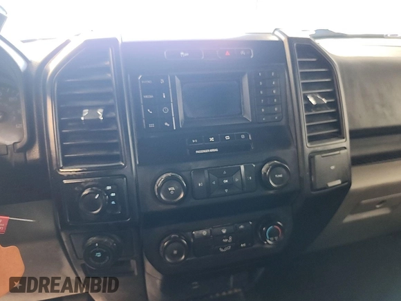 2019 Ford F-150 XL with VIN 1FTEX1E55KKC02870, listed as a IAAI auction lot 42631387 with 206,967 mi miles and . Bid and sale history available at DreamBid. Image 6.