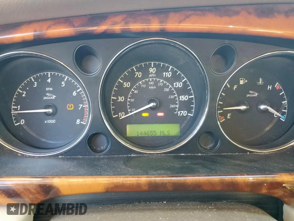 2008 Jaguar XJ with VIN SAJWA79B58SH20211, listed as a Copart auction lot 46951055 with 144,655 mi miles and Salvage Title. Bid and sale history available at carsss.com. Image 9.