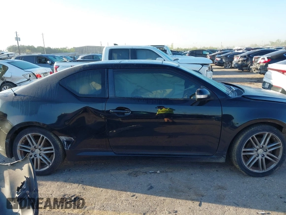 2013 Scion tC with VIN JTKJF5C77D3050609, listed as a IAAI auction lot 41872911 with 197,531 mi miles. Bid and sale history available at carsss.com. Image 14.