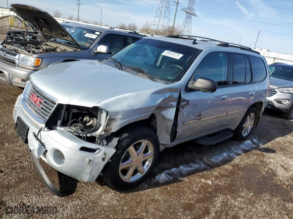 2008 GMC Envoy SLE2 with VIN 1GKDT13S182163210, listed as a Copart auction lot 49818125 with 169,147 mi miles and Salvage Title. Bid and sale history available at carsss.com. Image 1.