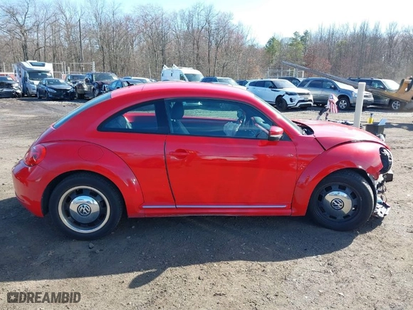 2012 Volkswagen Beetle 2.5L PZEV with VIN 3VWJP7AT5CM631505, listed as a IAAI auction lot 41733955 with 35,519 mi miles. Bid and sale history available at carsss.com. Image 13.