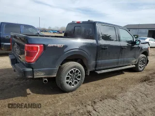 2023 Ford F-150 XL with VIN 1FTEW1EP5PKD18002, listed as a Copart auction lot 49512185 with 23,260 mi miles and Clean Title. Bid and sale history available at carsss.com. Image 3.