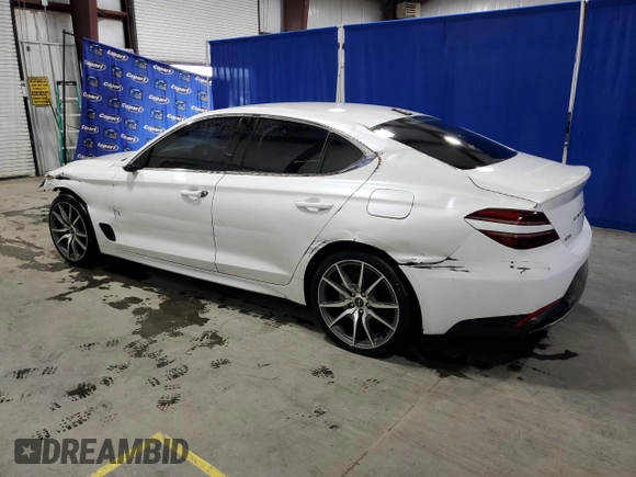 2023 Genesis G70 2.0T with VIN KMTG34TAXPU128221, listed as a Copart auction lot 71105154 with 43,626 mi miles and Non Repairable. Bid and sale history available at DreamBid. Image 2.