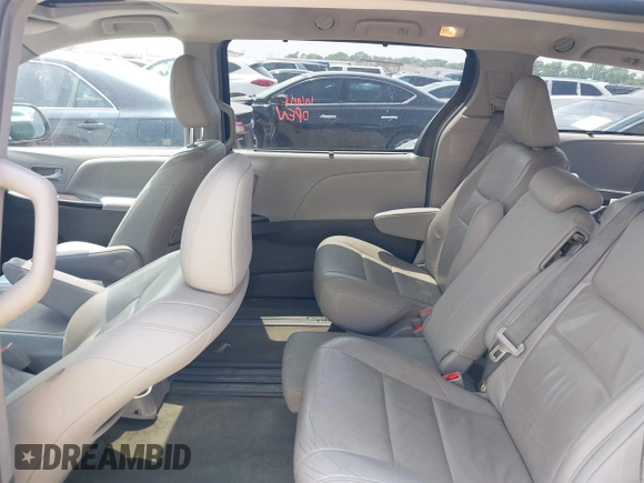2016 Toyota Sienna XLE z VIN 5TDYK3DC5GS703586, wystawiony jako IAAI lot #42323587 z przebiegiem 127 640 mil mil oraz . Historia ofert i sprzedaży dostępna na DreamBid. Obrazek 8.
