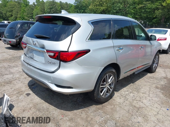 2020 Infiniti QX60 Luxe z VIN 5N1DL0MN7LC529460, wystawiony jako IAAI lot #42338248 z przebiegiem 97 883 mil mil oraz . Historia ofert i sprzedaży dostępna na DreamBid. Obrazek 4.