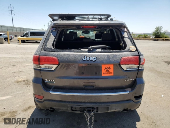 2014 Jeep Grand Cherokee Limited with VIN 1C4RJFBM3EC384398, listed as a Copart auction lot 57703835 with 153,255 mi miles and Salvage title. Bid and sale history available at DreamBid. Image 6.