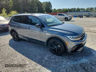 2023 Volkswagen Tiguan SE R-Line Black with VIN 3VVCB7AX3PM056471, listed as a Copart auction lot 60679225 with 94,752 mi miles and Clean title. Bid and sale history available at DreamBid. Image 4.