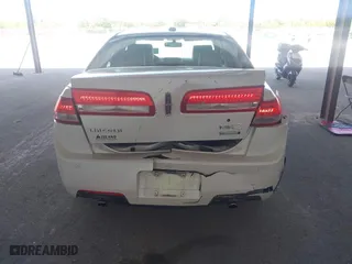 2012 Lincoln MKZ Hybrid with VIN 3LNDL2L3XCR832388, listed as a IAAI auction lot 42065660 with 196,940 mi miles. Bid and sale history available at carsss.com. Image 6.