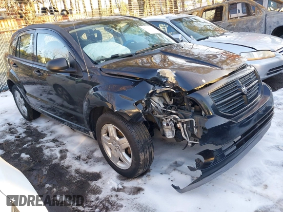 2009 Dodge Caliber SXT with VIN 1B3HB48A89D118869, listed as a IAAI auction lot 41315552 with 198,986 mi miles and . Bid and sale history available at DreamBid. Image 1.