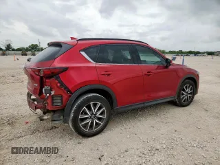 2018 Mazda CX-5 Grand Touring with VIN JM3KFADM8J0451535, listed as a Copart auction lot 59990435 with 77,163 mi miles and Salvage title. Bid and sale history available at DreamBid. Image 3.