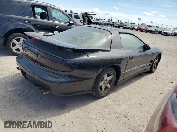 2000 Pontiac Firebird Formula z VIN 2G2FV22G9Y2140113, wystawiony jako Copart lot #76135324 z przebiegiem Nie podano mil oraz Szkoda całkowita • Salvage title. Historia ofert i sprzedaży dostępna na DreamBid. Obrazek 3.