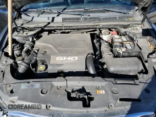 2011 Ford Taurus SHO with VIN 1FAHP2KT6BG128180, listed as a Copart auction lot 47462885 with 128,403 mi miles and Salvage Title. Bid and sale history available at DreamBid. Image 11.