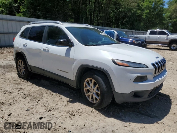 2014 Jeep Cherokee Latitude with VIN 1C4PJMCS6EW244336, listed as a Copart auction lot 52597835 with 167,266 mi miles and Salvage Title. Bid and sale history available at DreamBid. Image 4.
