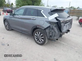 2019 Infiniti QX50 Luxe with VIN 3PCAJ5M19KF135211, listed as a IAAI auction lot 42308891 with 128,432 mi miles and . Bid and sale history available at DreamBid. Image 3.