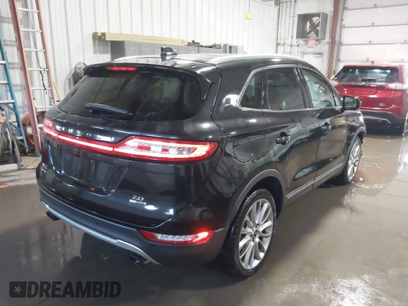 2015 Lincoln MKC with VIN 5LMCJ1A98FUJ10348, listed as a IAAI auction lot 41566416 with 133,035 mi miles and . Bid and sale history available at DreamBid. Image 4.