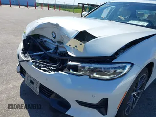2021 BMW 3 Series 330i xDrive with VIN WBA5R7C0XMFK54525, listed as a IAAI auction lot 42320181 with 54,576 mi miles and . Bid and sale history available at DreamBid. Image 6.