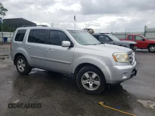 2011 Honda Pilot EX-L with VIN 5FNYF3H71BB033923, listed as a Copart auction lot 56649305 with 132,304 mi miles and Salvage title. Bid and sale history available at DreamBid. Image 4.