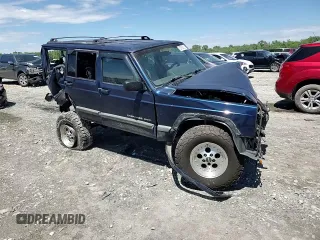 2001 Jeep Cherokee Sport z VIN 1J4FF48S71L555513, wystawiony jako Copart lot #55780315 z przebiegiem Nie podano mil oraz Szkoda całkowita • Salvage title. Historia ofert i sprzedaży dostępna na DreamBid. Obrazek 13.