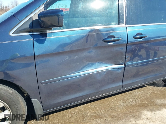 2010 Honda Odyssey EX-L with VIN 5FNRL3H76AB058912, listed as a IAAI auction lot 41558361 with 206,841 mi miles and . Bid and sale history available at DreamBid. Image 6.