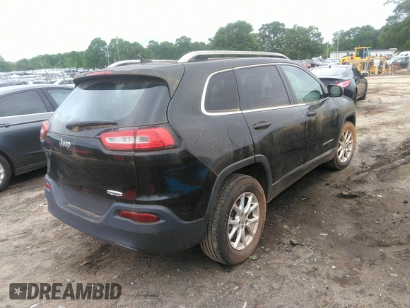 2014 Jeep Cherokee Latitude with VIN 1C4PJLCB1EW231178, listed as a IAAI auction lot 42128894 with 121,412 mi miles. Bid and sale history available at carsss.com. Image 4.
