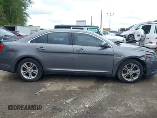 2013 Ford Taurus SEL z VIN 1FAHP2H84DG139362, wystawiony jako IAAI lot #42367272 z przebiegiem 232 500 mil mil oraz . Historia ofert i sprzedaży dostępna na DreamBid. Obrazek 13.