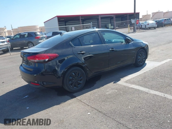 2018 Kia Forte LX with VIN 3KPFK4A77JE209753, listed as a IAAI auction lot 41896792 with 68,623 mi miles. Bid and sale history available at carsss.com. Image 4.