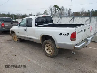 1999 Dodge Dakota SLT with VIN 1B7GG22X3XS223969, listed as a IAAI auction lot 41329085 with 185,859 mi miles and . Bid and sale history available at carsss.com. Image 3.