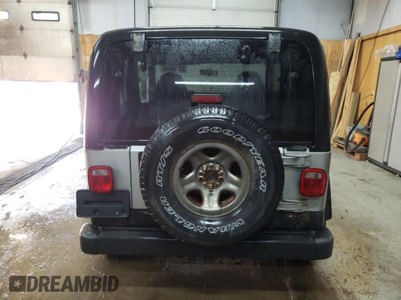 2000 Jeep Wrangler SE with VIN 1J4FA29PXYP714587, listed as a Copart auction lot 83755044 with 125,451 mi miles and Clean Title. Bid and sale history available at carsss.com. Image 6.