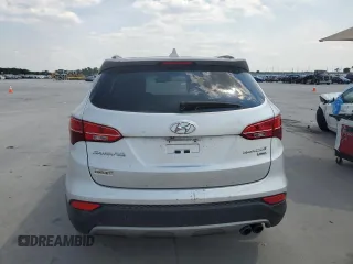2013 Hyundai Santa Fe Sport z VIN 5XYZUDLA2DG069389, wystawiony jako Copart lot #64054684 z przebiegiem 162 861 mil mil oraz Szkoda całkowita • Salvage title. Historia ofert i sprzedaży dostępna na DreamBid. Obrazek 6.