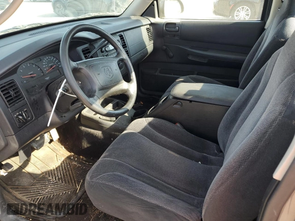 2003 Dodge Dakota with VIN 1D7FL16X13S189963, listed as a Copart auction lot 77114344 with 100,127 mi miles and Salvage Title. Bid and sale history available at carsss.com. Image 8.