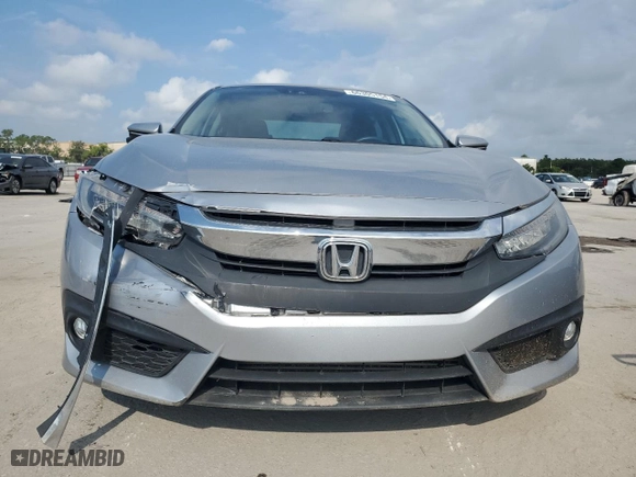 2017 Honda Civic Sedan Touring with VIN 19XFC1F98HE018889, listed as a Copart auction lot 66305154 with 58,571 mi miles and Salvage Title. Bid and sale history available at carsss.com. Image 5.