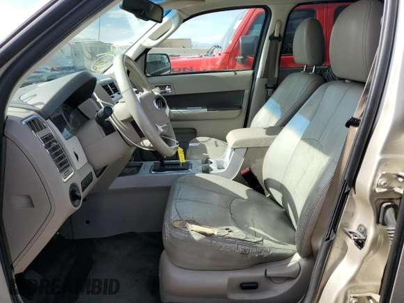 2010 Mercury Mariner Premier z VIN 4M2CN8HG0AKJ00727, wystawiony jako Copart lot #51244455 z przebiegiem 125 675 mil mil oraz Szkoda całkowita • Salvage title. Historia ofert i sprzedaży dostępna na DreamBid. Obrazek 7.