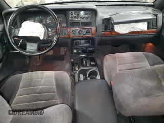 1998 Jeep Grand Cherokee Laredo with VIN 1J4GZ58S3WC207166, listed as a Copart auction lot 84243704 with 124,084 mi miles and Salvage Title. Bid and sale history available at carsss.com. Image 8.