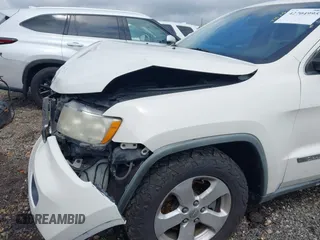 2011 Jeep Grand Cherokee Laredo with VIN 1J4RR4GG7BC701007, listed as a IAAI auction lot 42704995 with 145,956 mi miles and . Bid and sale history available at DreamBid. Image 16.