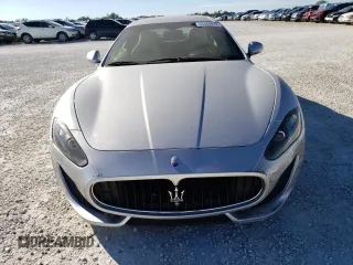 2013 Maserati GranTurismo Sport with VIN ZAM45VLA8D0067421, listed as a Copart auction lot 69464472 with Not provided miles and Salvage title. Bid and sale history available at DreamBid. Image 5.