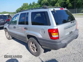 2004 Jeep Grand Cherokee Laredo with VIN 1J4GW48S84C116717, listed as a IAAI auction lot 42568586 with 228,233 mi miles and . Bid and sale history available at DreamBid. Image 3.