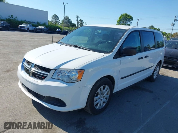 2015 Dodge Grand Caravan SE with VIN 2C4RDGBGXFR569435, listed as a IAAI auction lot 42057084 with 160,058 mi miles and . Bid and sale history available at DreamBid. Image 2.