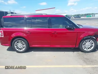 2014 Ford Flex SEL z VIN 2FMGK5C83EBD18039, wystawiony jako IAAI lot #42256317 z przebiegiem 104 941 mil mil oraz . Historia ofert i sprzedaży dostępna na DreamBid. Obrazek 13.