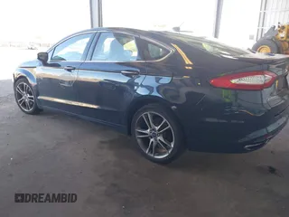 2014 Ford Fusion Titanium with VIN 3FA6P0K97ER328482, listed as a IAAI auction lot 40252350 with 137,128 mi miles. Bid and sale history available at carsss.com. Image 3.