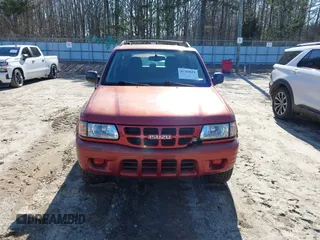 2001 Isuzu Rodeo S with VIN 4S2CK58W814326849, listed as a IAAI auction lot 41769624 with 366,460 mi miles and . Bid and sale history available at DreamBid. Image 6.