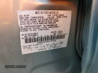 2005 Ford Five Hundred SE z VIN 1FAFP23185G157074, wystawiony jako Copart lot #54209285 z przebiegiem 195 519 mil mil oraz Szkody całkowita. Historia ofert i sprzedaży dostępna na DreamBid. Obrazek 12.